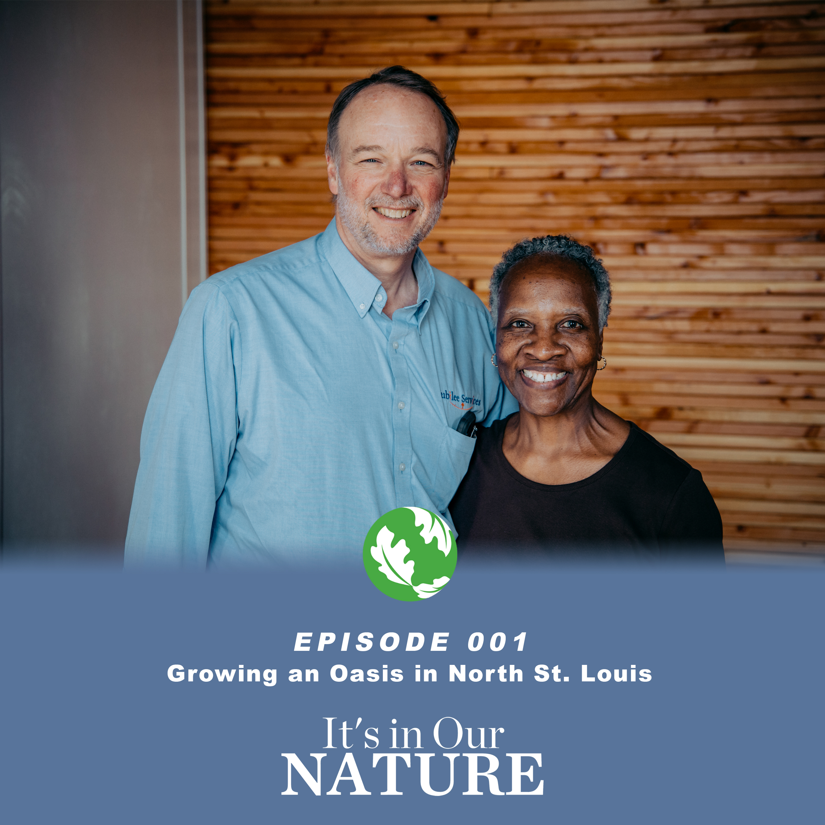 A man and woman standing next to each other smiling for the picture. 