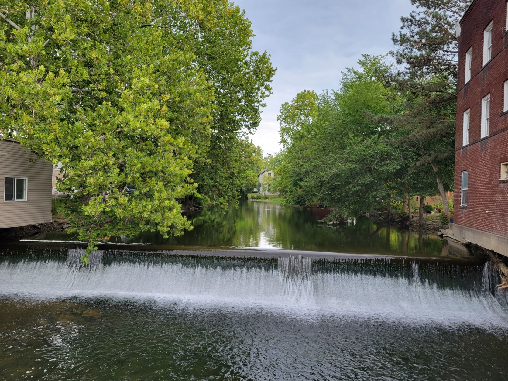 A dam extends across a river.