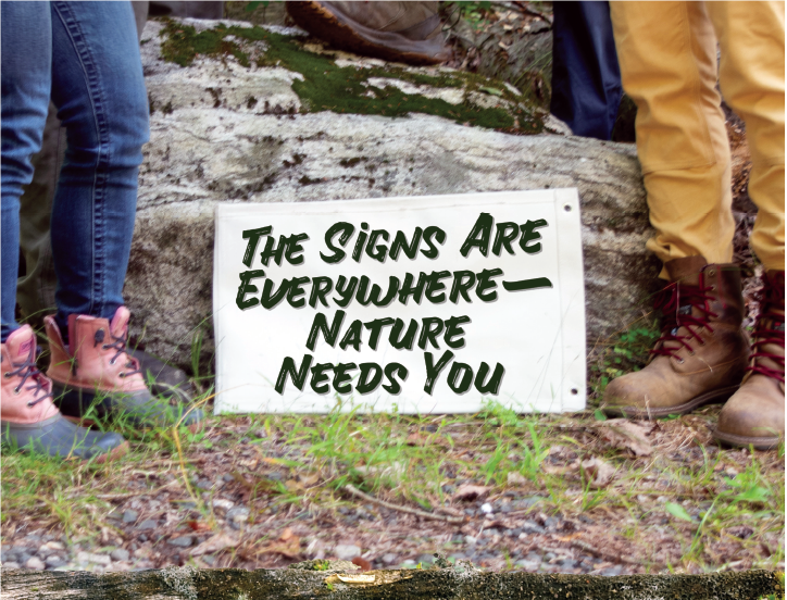 A sign shares a message that "nature needs you."