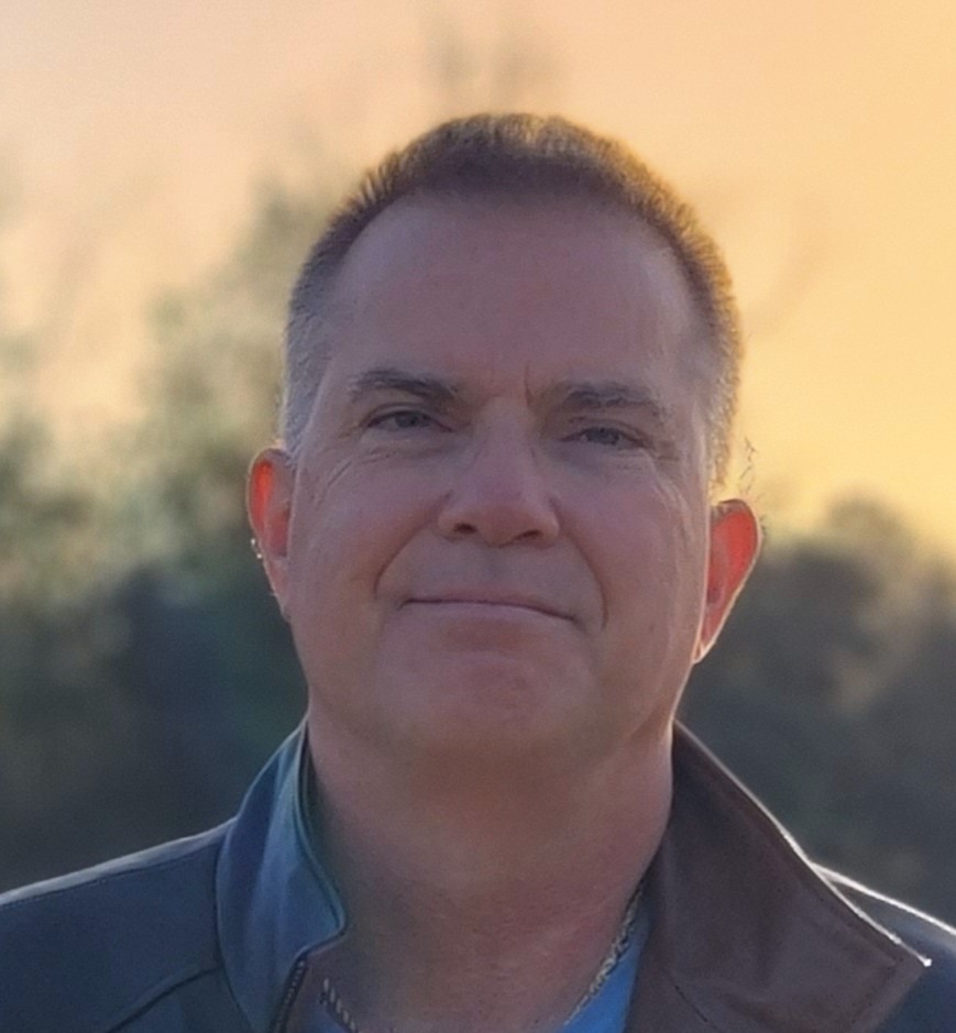 Darryl Boudreau smiles for his portrait.