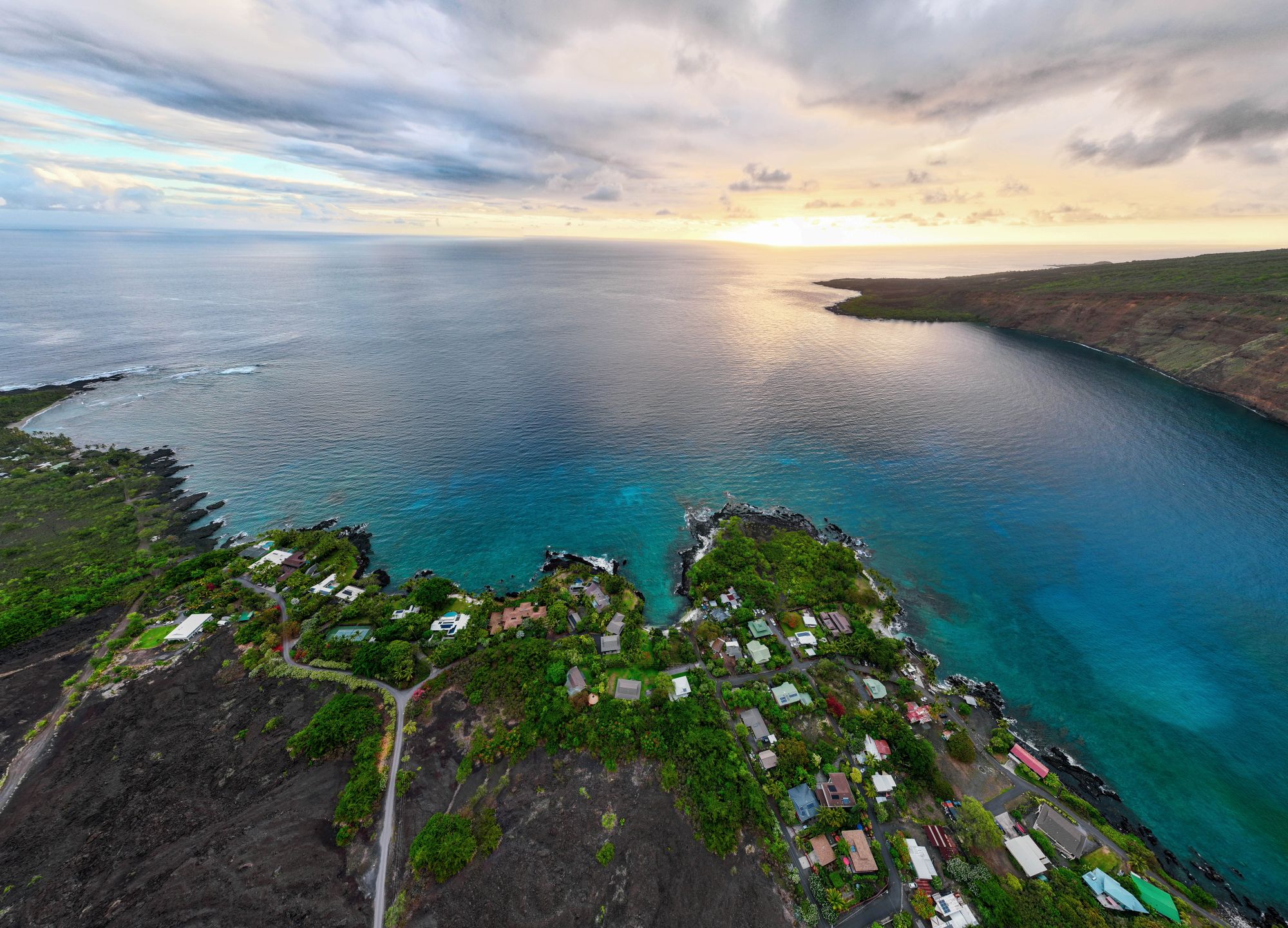 A small town surrounds a small cove.