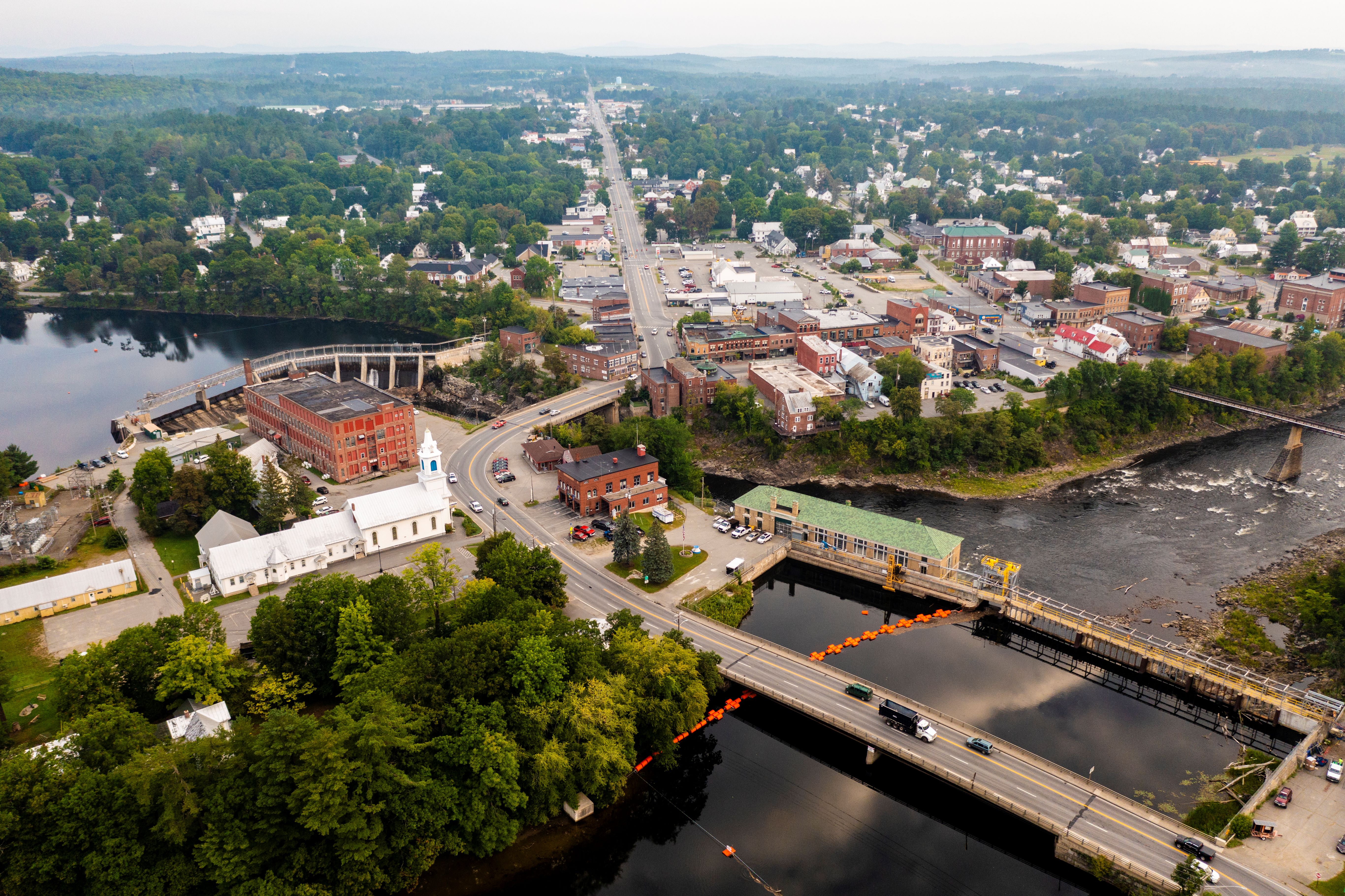 An aerial view of a dam and community on the Kennebec.