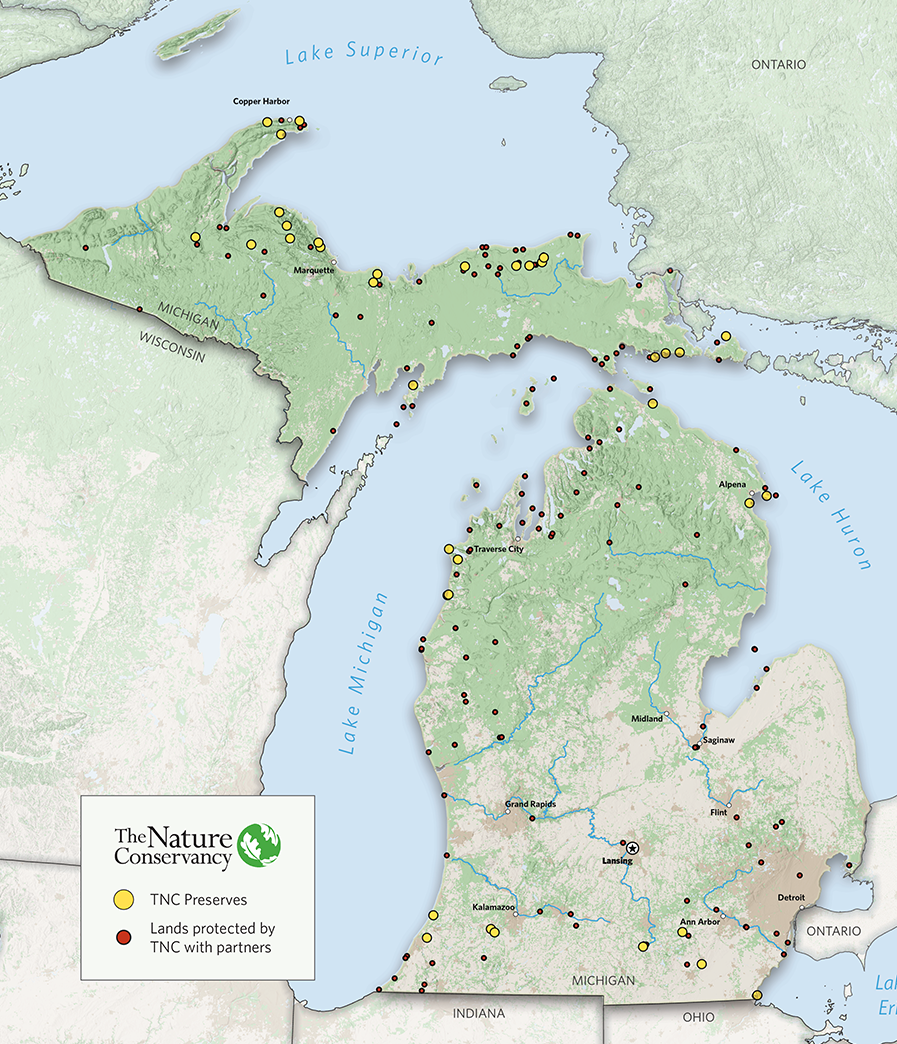 A map of Michigan with dots indicating TNC preserves and land protected by TNC partners.