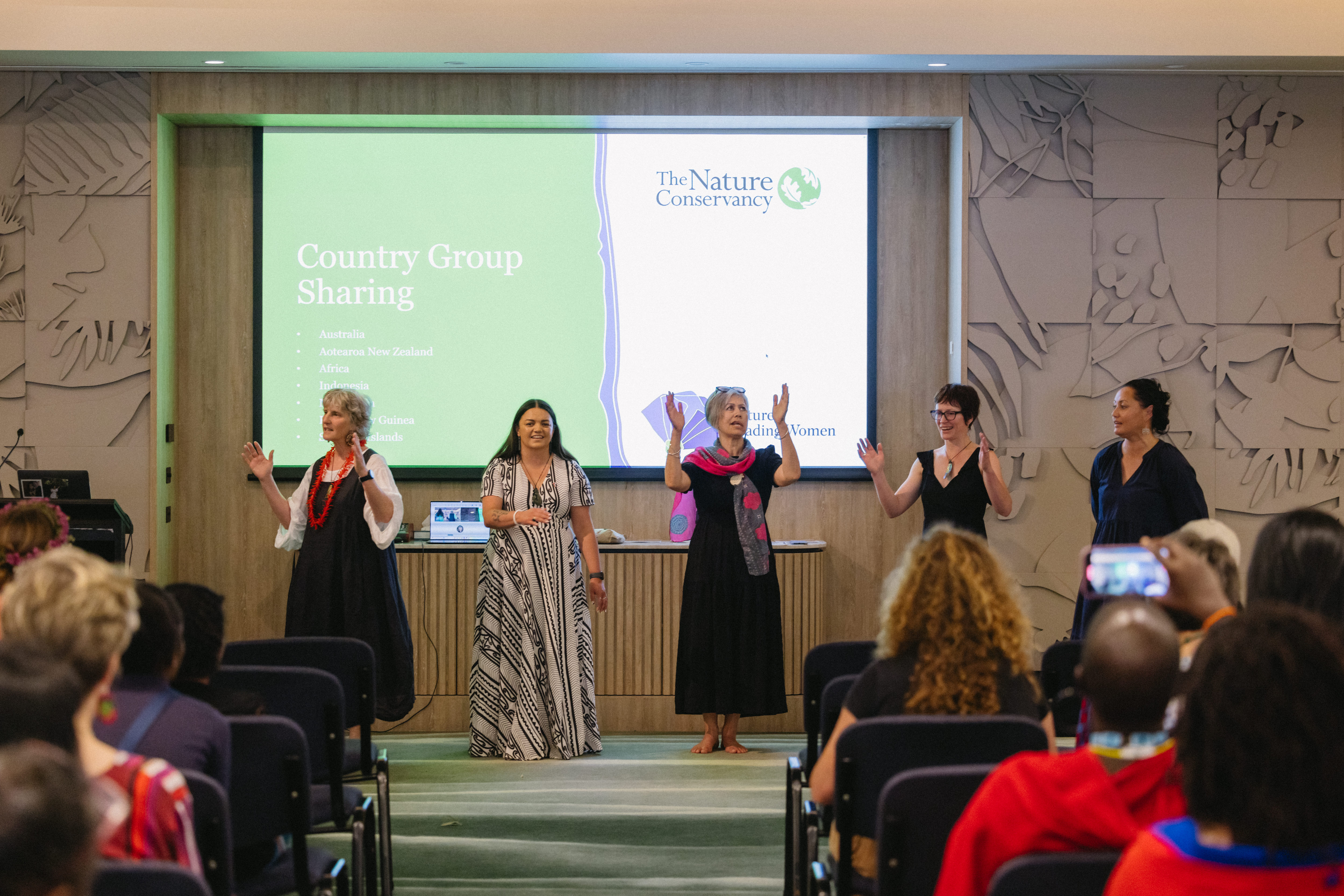 FIve women dance on a stage