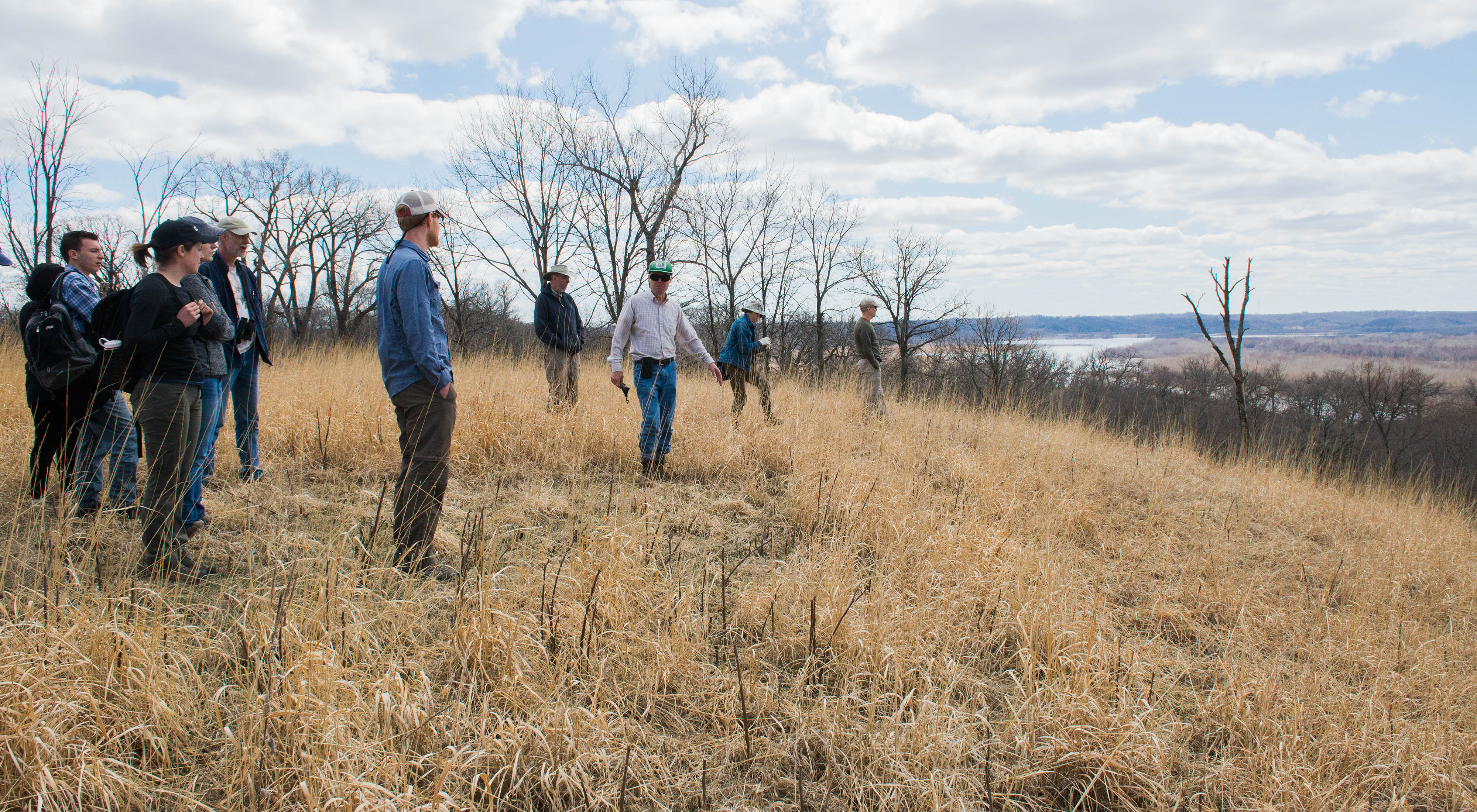People standing in a prairie.