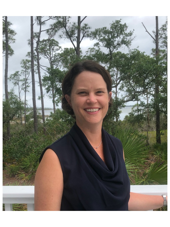 Randall Hughes smiles for his portrait.