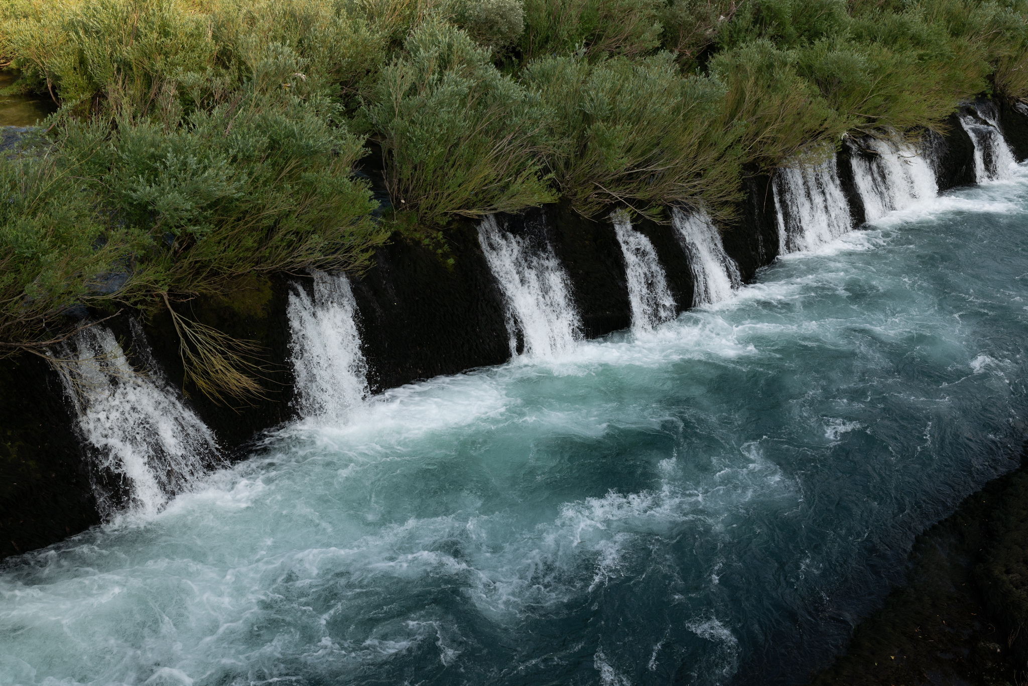 House on the riverside of the Buna. 