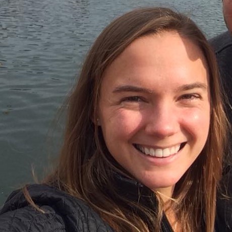 Tori Tomiczek smiles for a portrait.